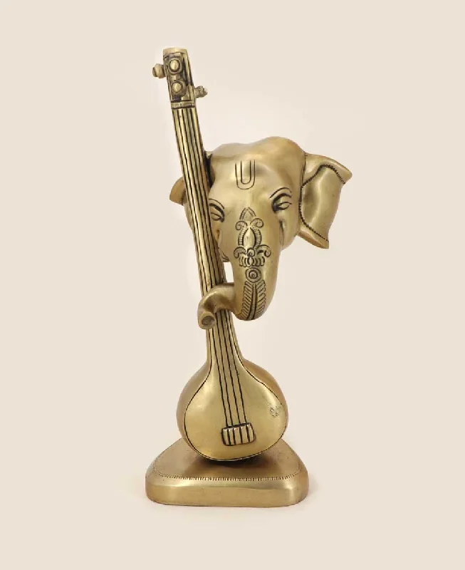 Unique industrial wall shelf-Artistic Abstract Brass Ganesh Statue Playing Sitar